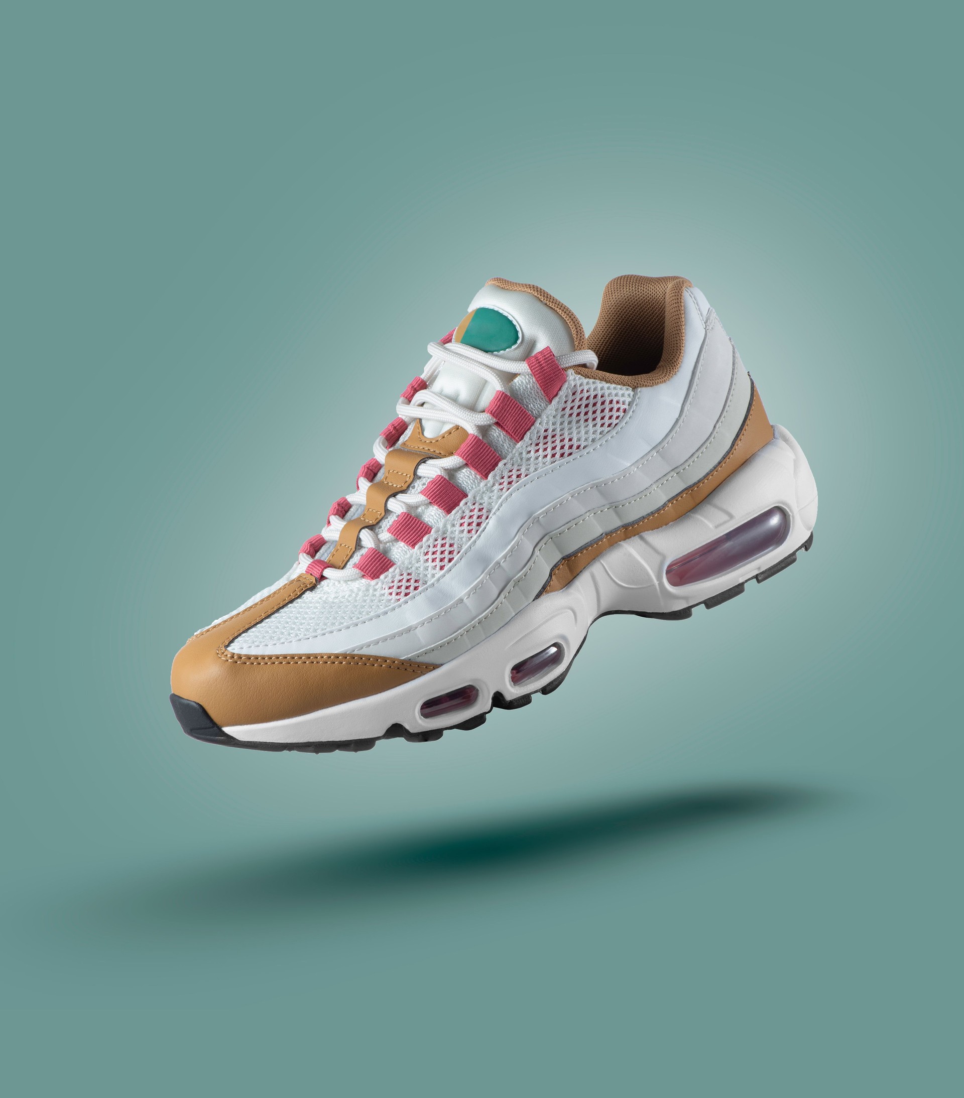 White sneaker with colored accents on a green gradient background, men's fashion, sport shoe,  air, sneakers, lifestyle, concept, product photo,  levitation concept, street wear, trainer